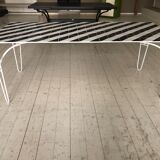 Iron table with top in black and white ceramic tiles