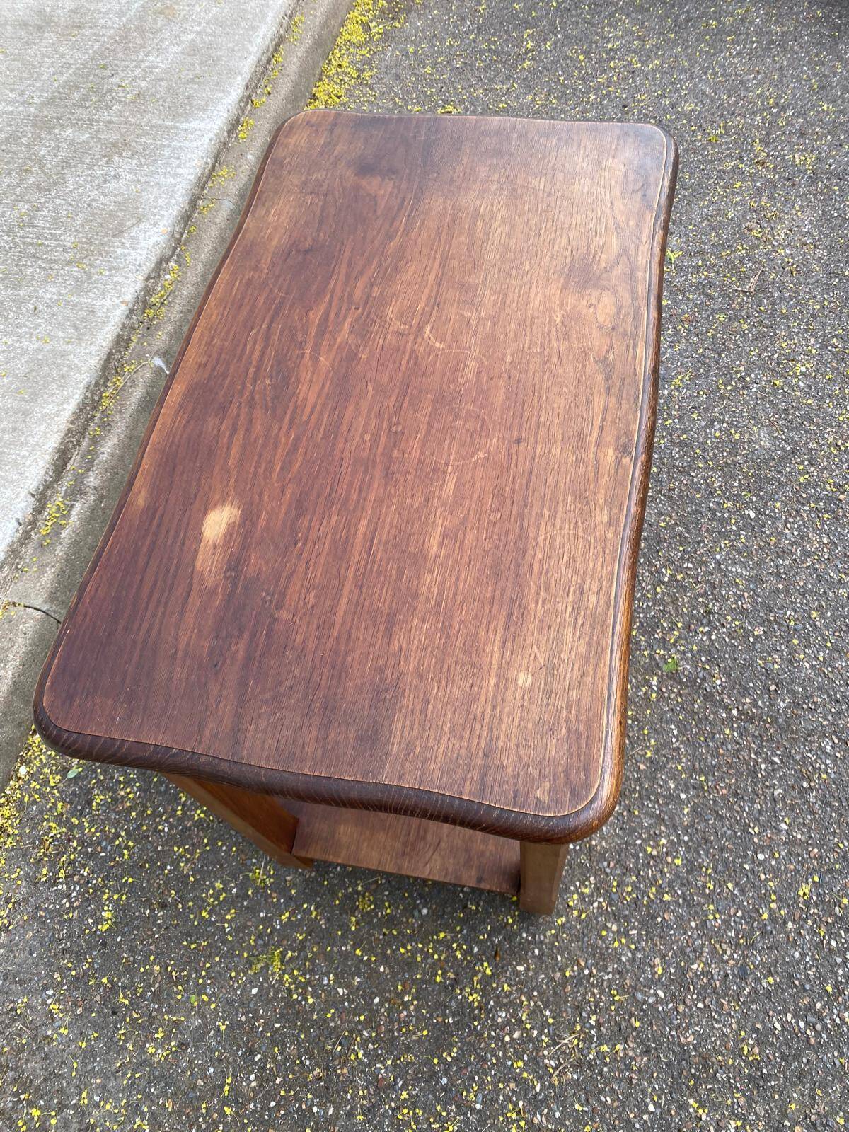 Vintage farmhouse dessert trolley on wheels made of solid wood from the 19th century.