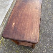 Vintage farmhouse dessert trolley on wheels made of solid wood from the 19th century.