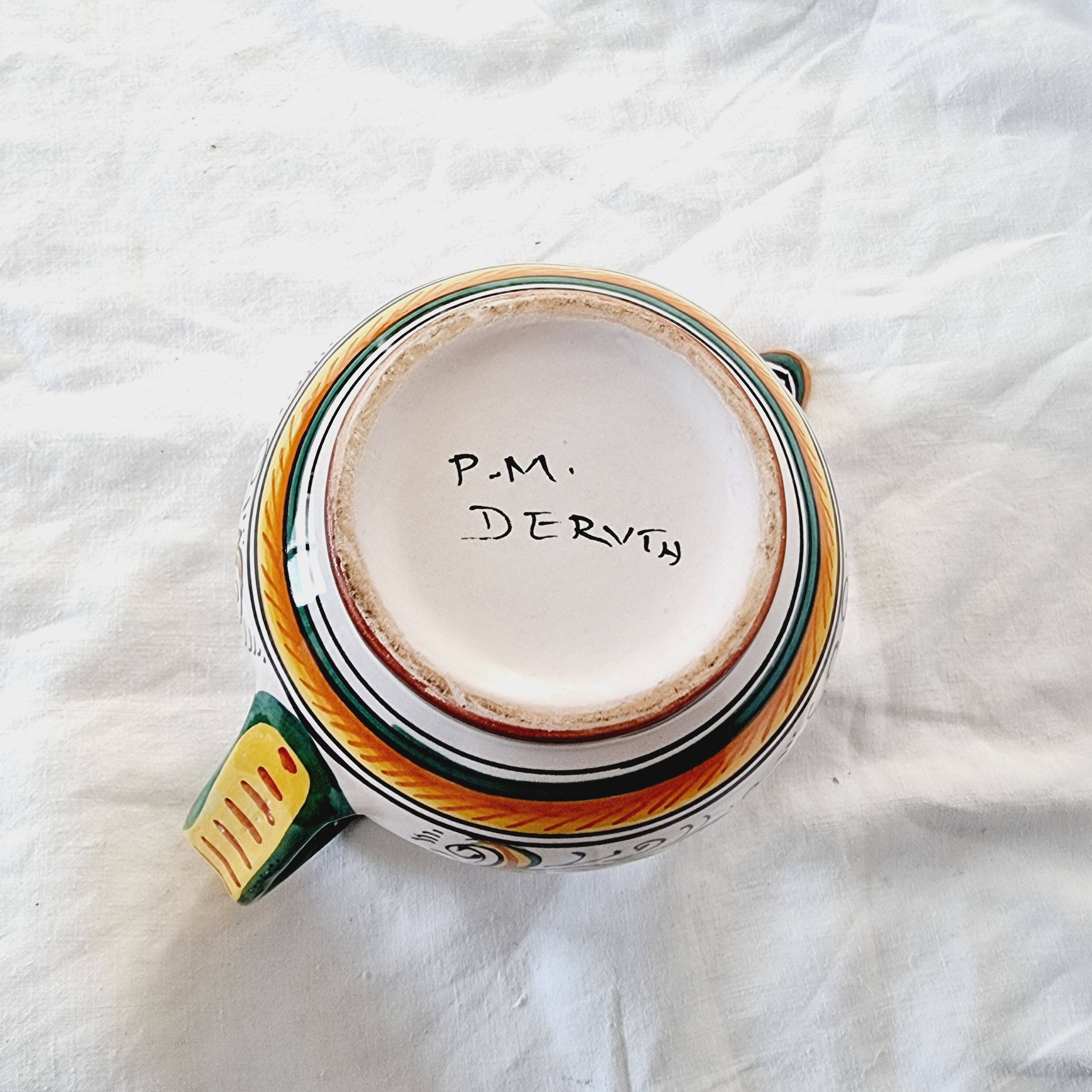 Majolica ceramic jug by R. Deruta, Italy, hand-painted, with a long spout.  Decorated with a dragon tree