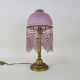 Table lamp, bedside lamp, speckled pink globe and glass and wood beads. Year 60