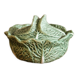 Covered pot in slip, collard greens