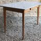Table de cuisine 1960’s en formica et piétement compas bois