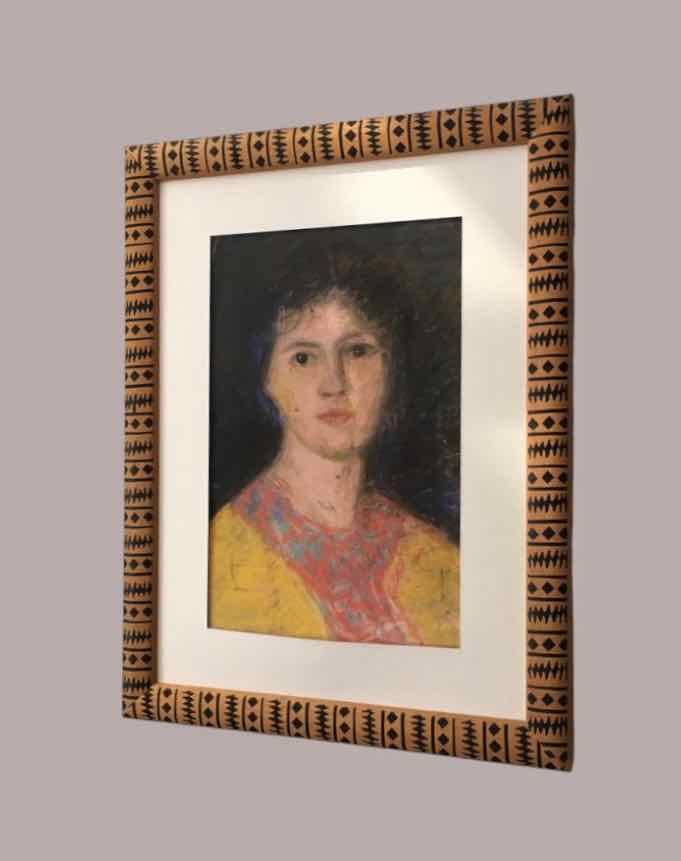 Old pastel portrait of young woman from the 1930s