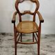 Children's high chair in wood and cane