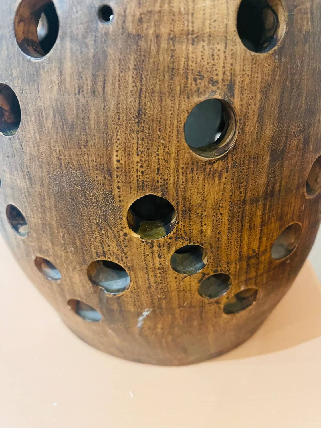 Terracotta lamp with cut-outs, circa 1970.