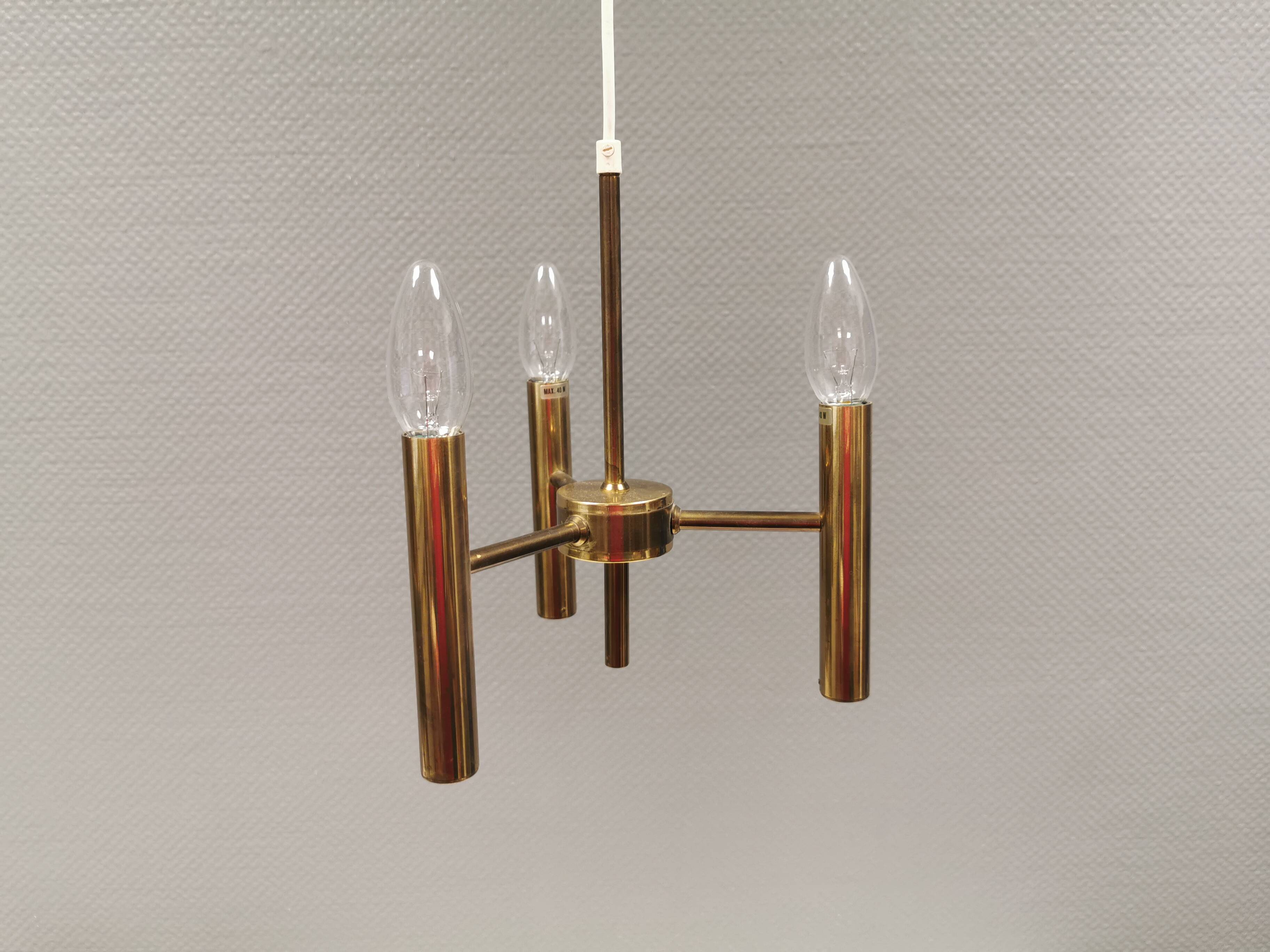 Chandelier with 3 light sources, made of metal and brass. 1960-70s