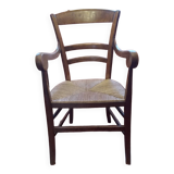 Old rustic straw armchair