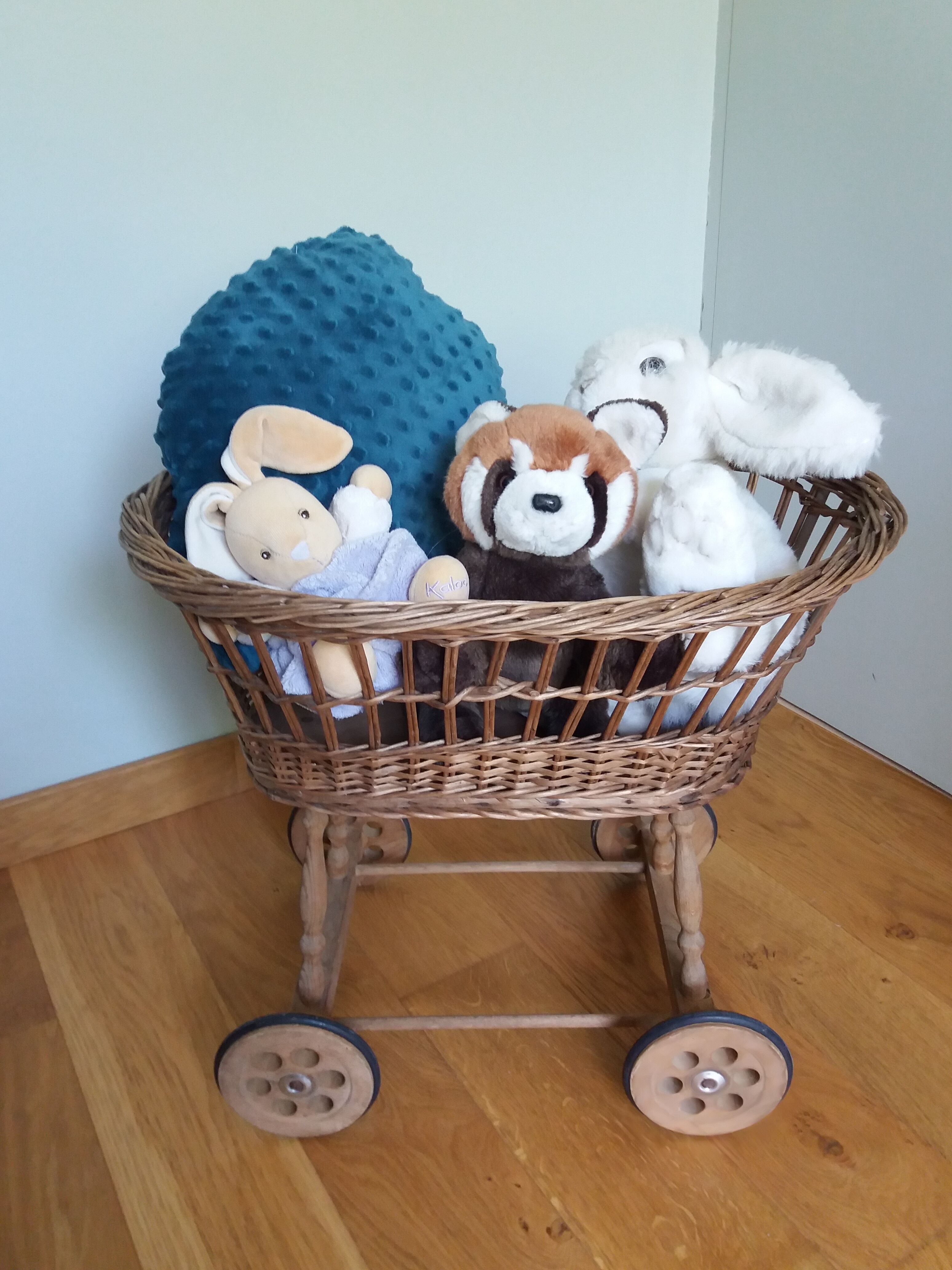 Wicker rattan doll cradle with wheels