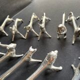 12 animal knife holders in tin