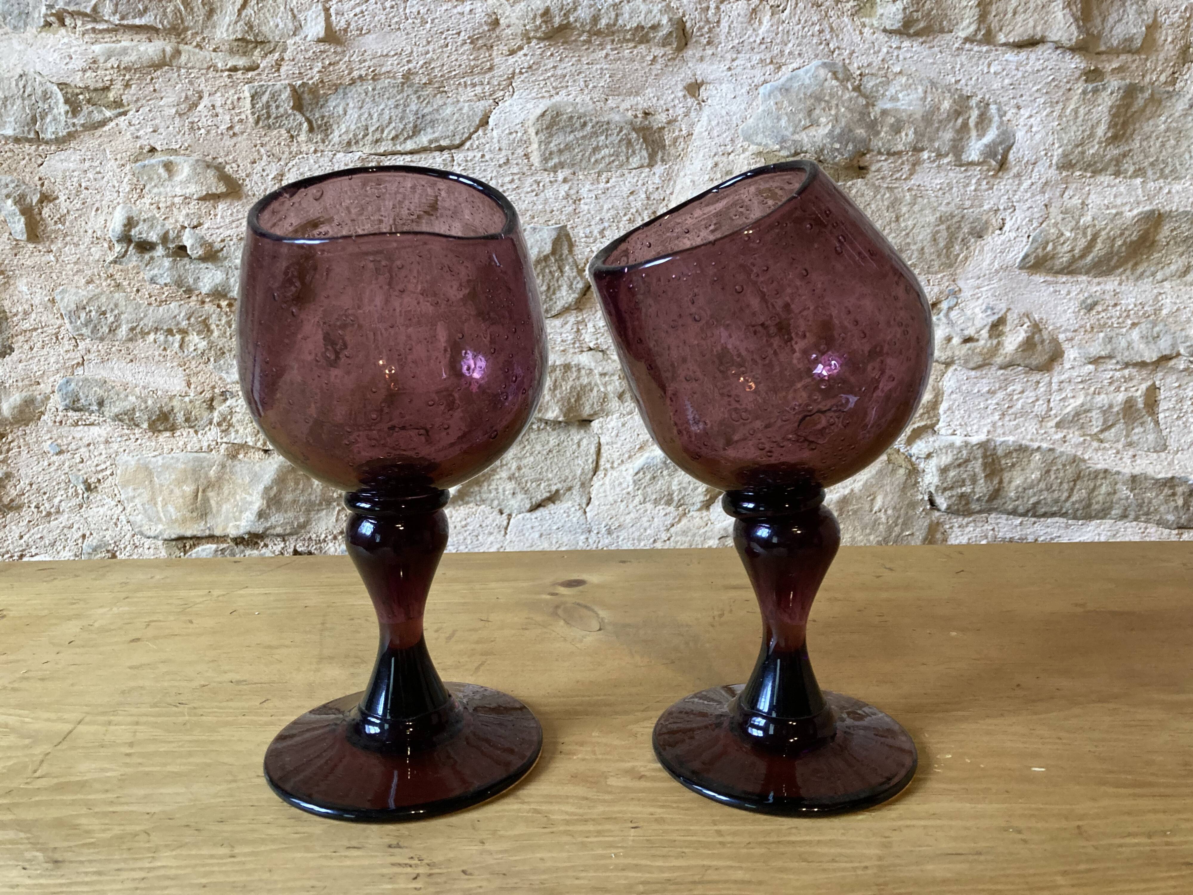 Duo of purple tinted bubbled glass cups