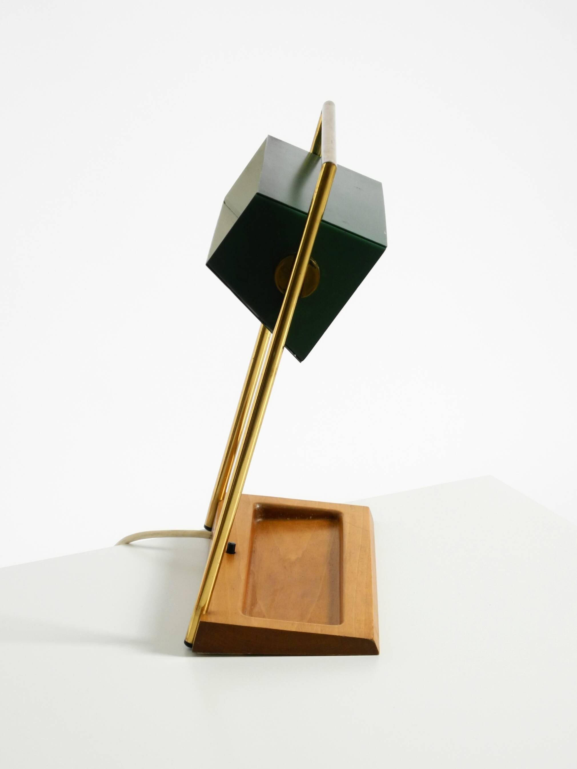 1960s Temde table lamp with a brass frame, teak base, and green lampshade