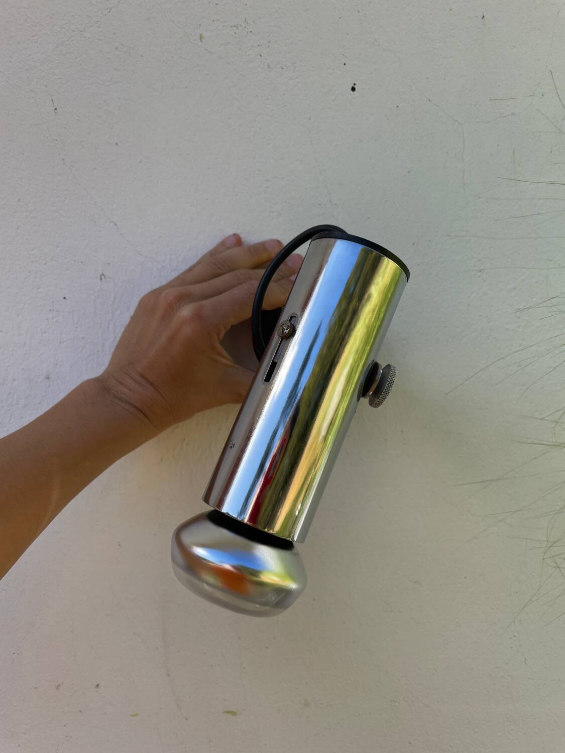 Pair of chrome metal wall lights from the 1970s.