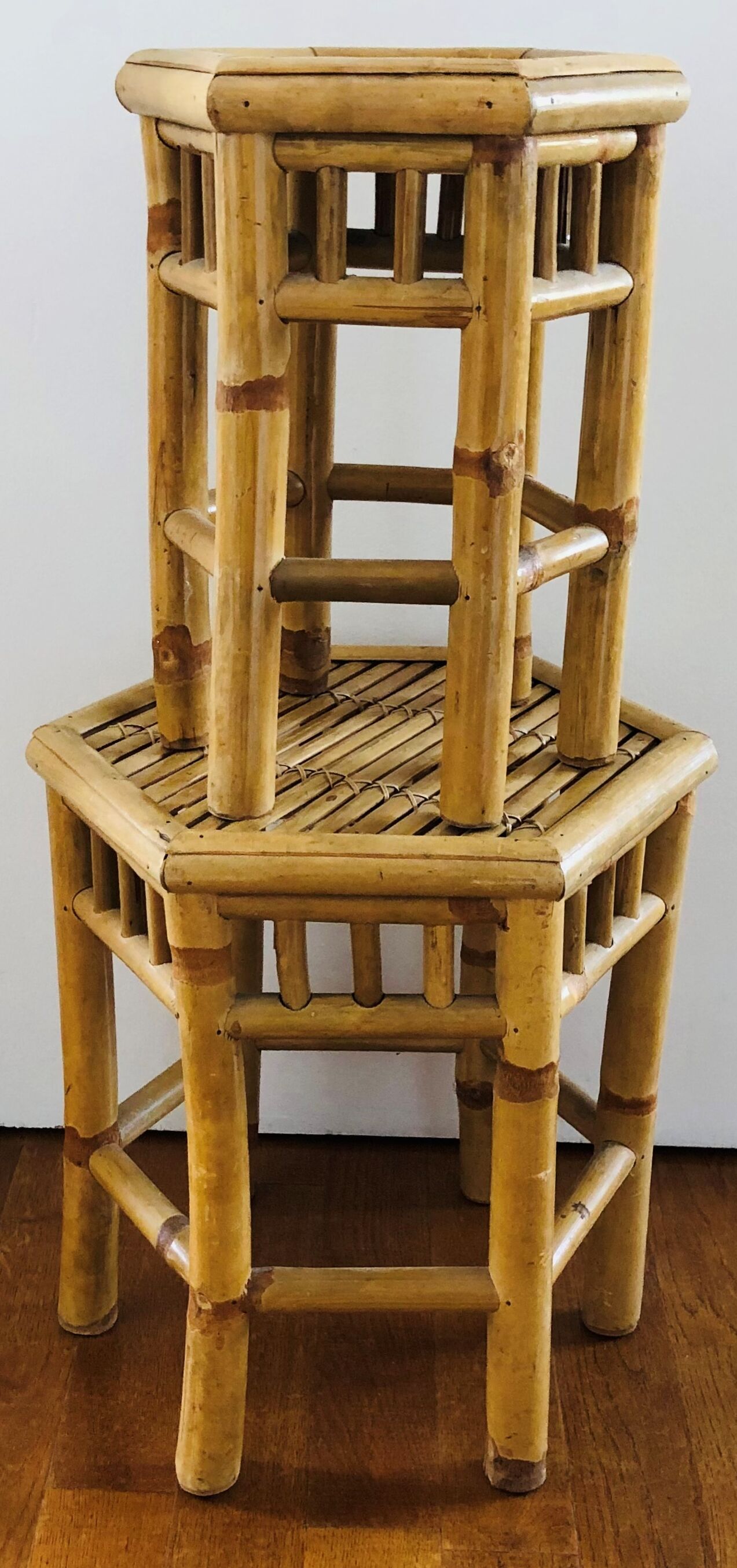 Two rattan side tables