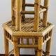 Two rattan side tables