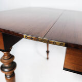 Antique game table with extention, of mahogany and walnut, 1860s