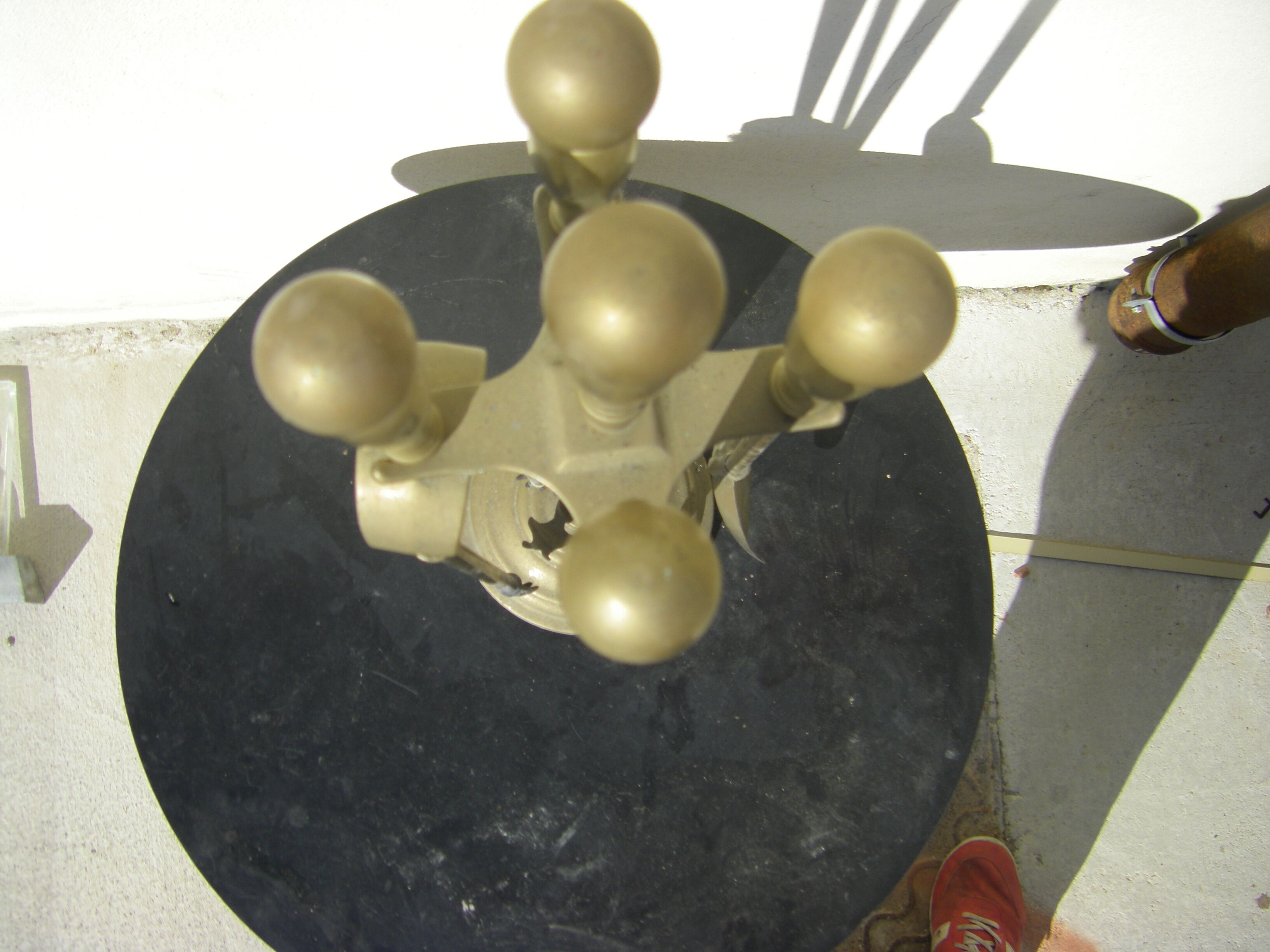 Gilded brass fireplace servant.