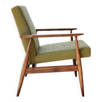Mid-century modern armchair in olive green bouclé design by H. Lis.