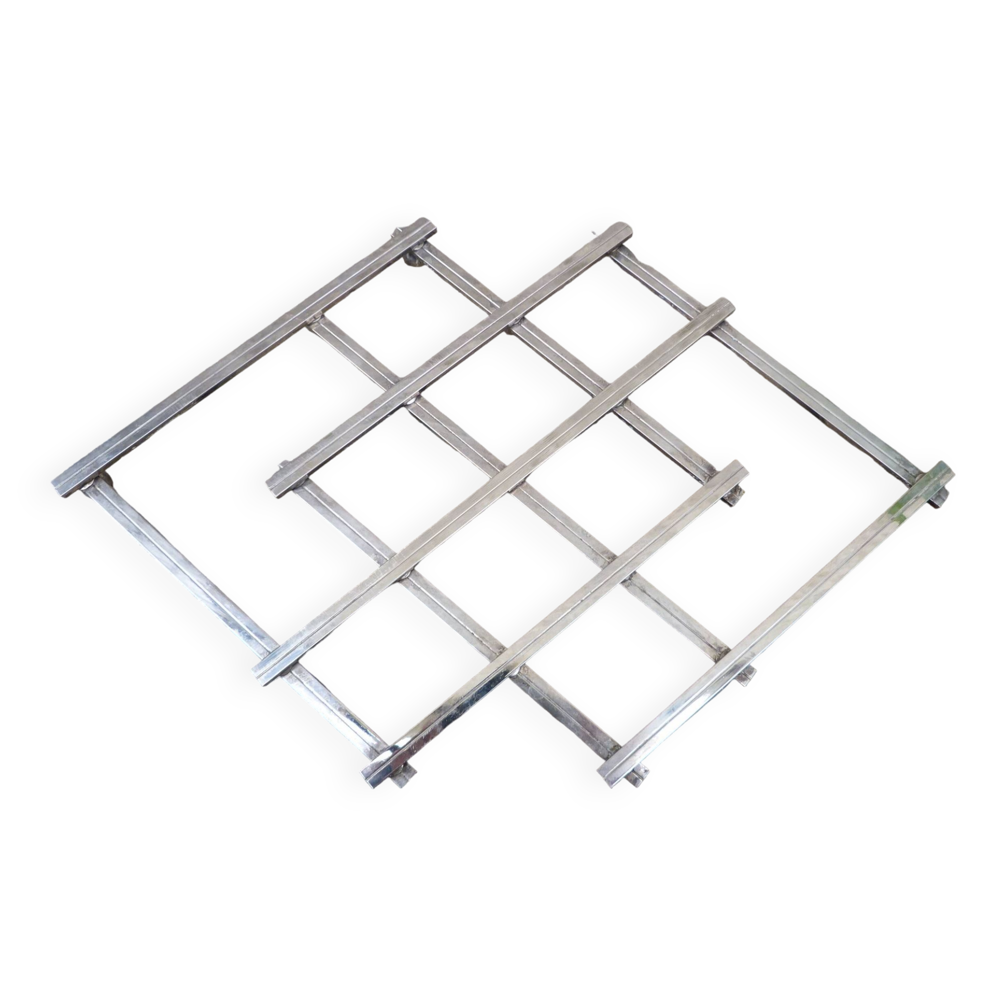 Modernist design foldable trivet in silver metal Jacques Adnet 1940/1950