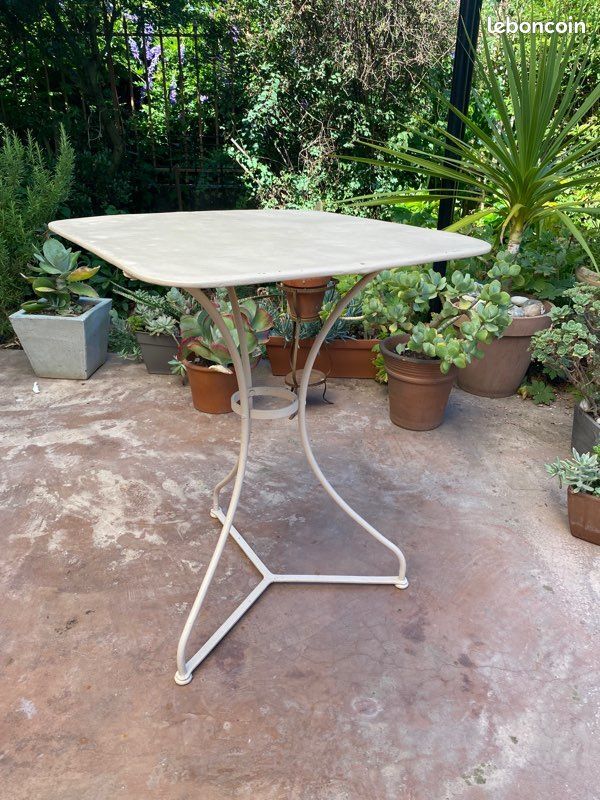 Wrought iron pedestal table