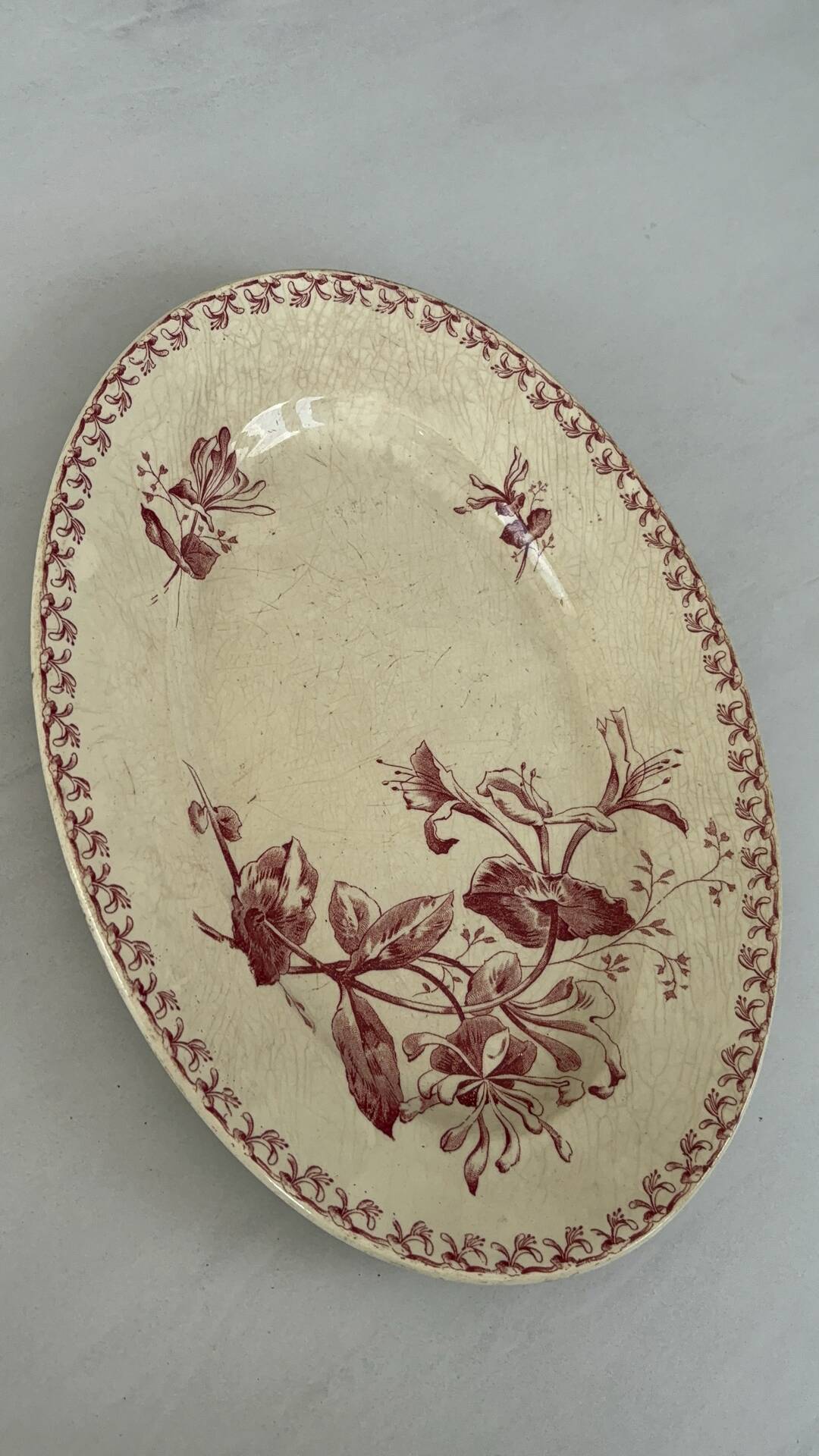 Oval plate, red iron earth, Gien honeysuckle model - antique earthenware