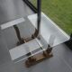 Art Deco coffee table in glass, wood, and brass.