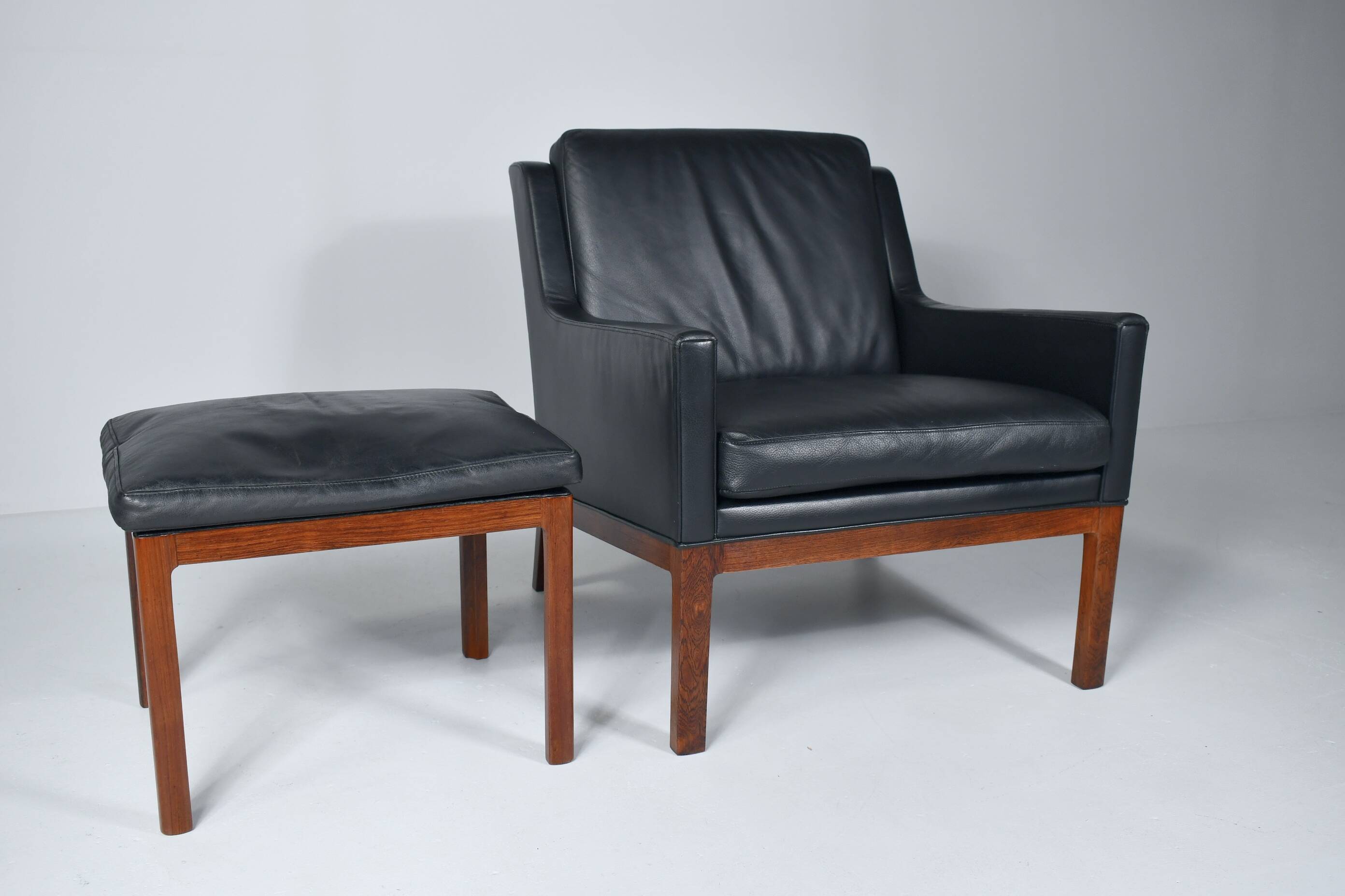 Leather armchair and footstool by Kai Lyngfeldt-Larsen. Denmark 1960s