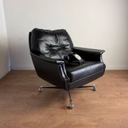 Vintage armchair published by Möbel Mann – elegant black