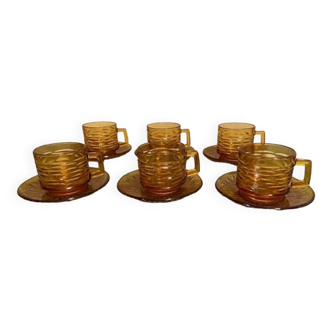 Vintage amber glass cups and saucers