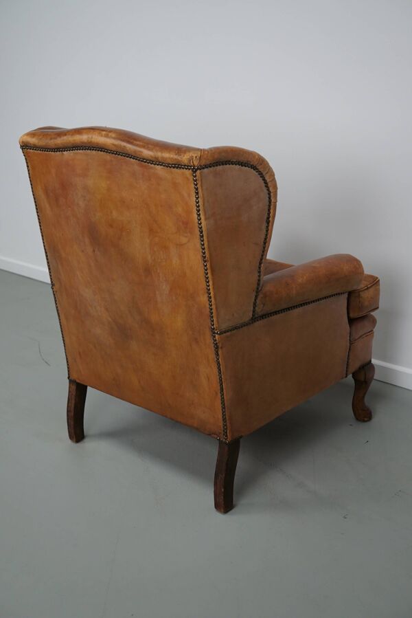 Fauteuil club vintage hollandais en cuir couleur cognac, avec repose-pieds