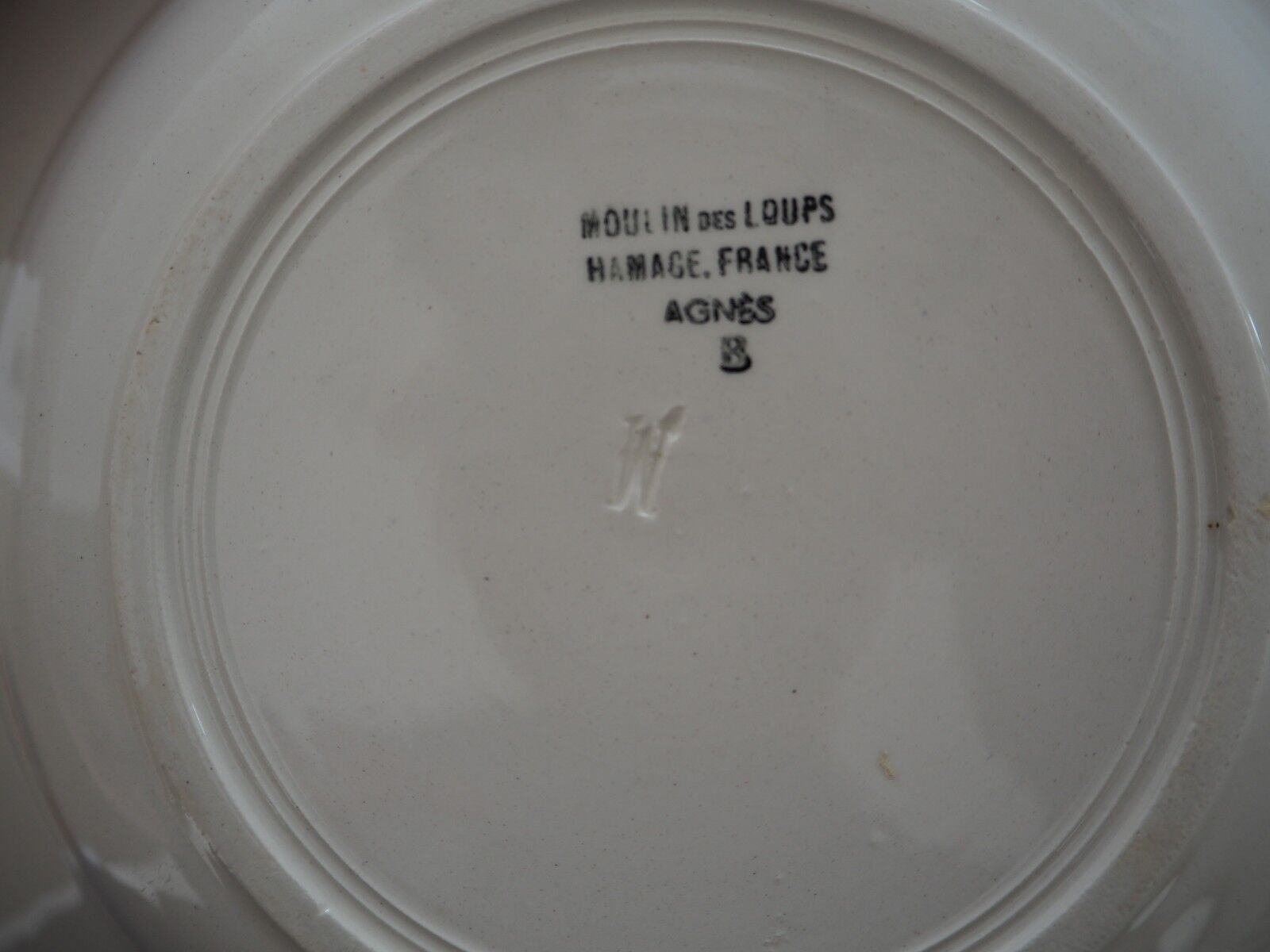 5 blue Agnes B plates