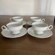 Set of 4 Hutschenreuther fine porcelain cups and saucers.