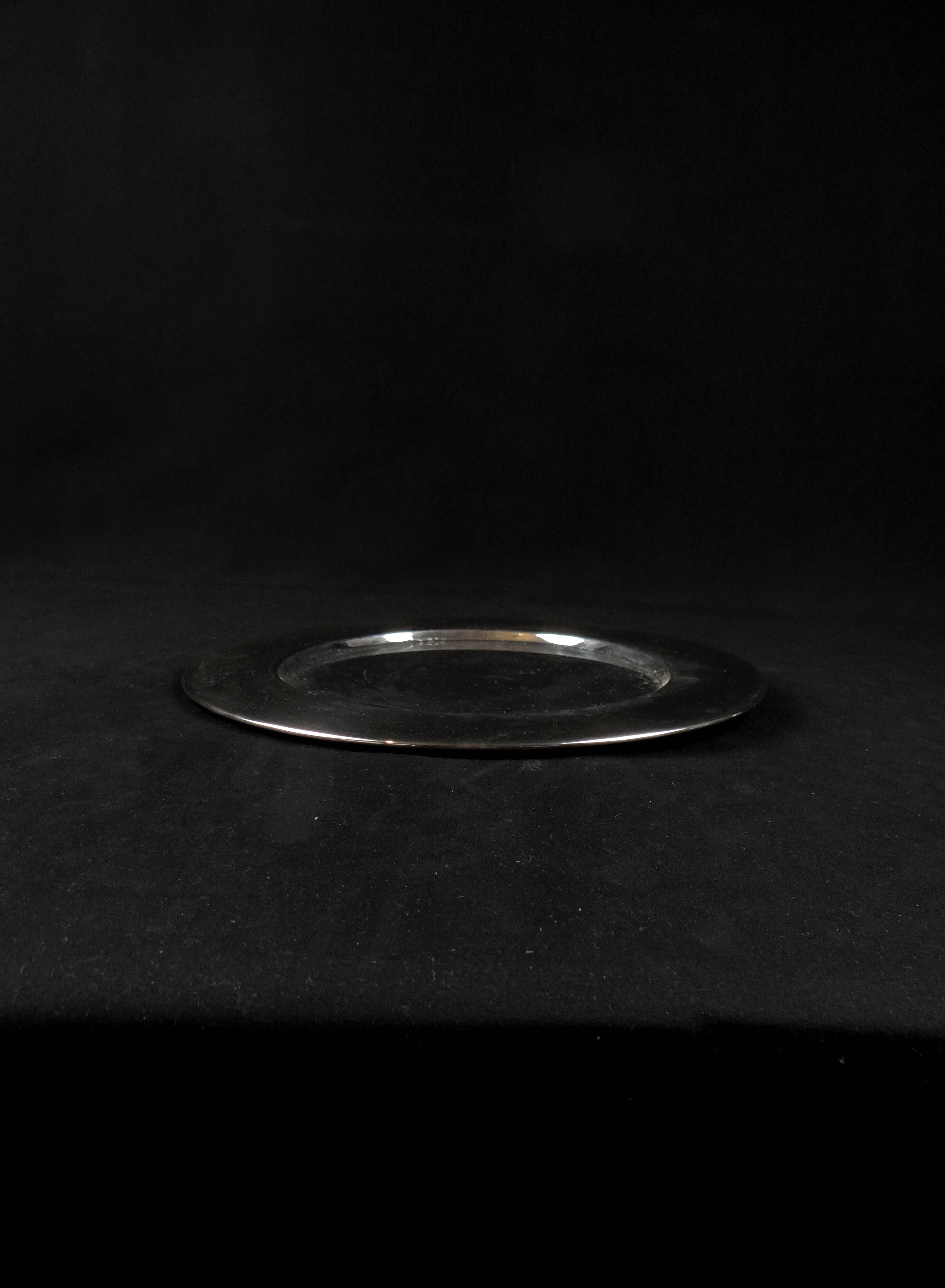 Set of 8 round serving platters or saucers in vintage stainless steel