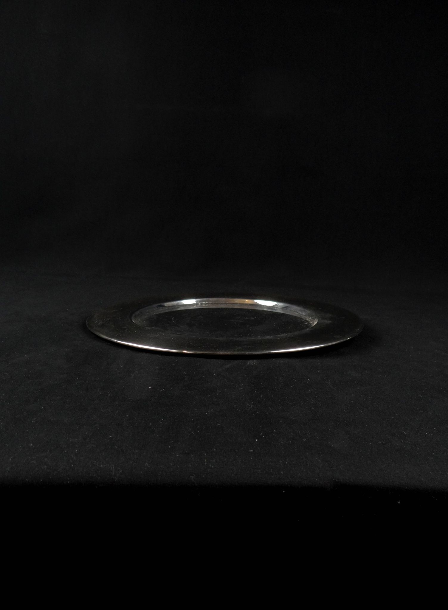 Set of 8 round serving platters or saucers in vintage stainless steel
