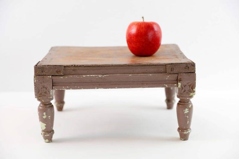 Antique Bajot stool in weathered wood: richly patinated decorative table.