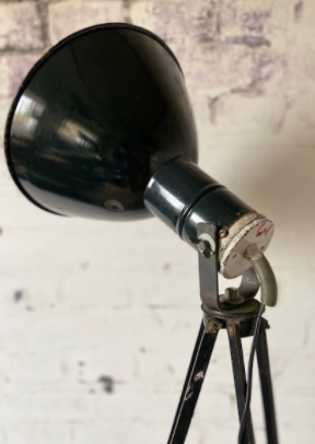 Old industrial projector on support
