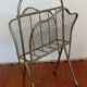 Brass magazine rack in neo-classical style, 20th century.
