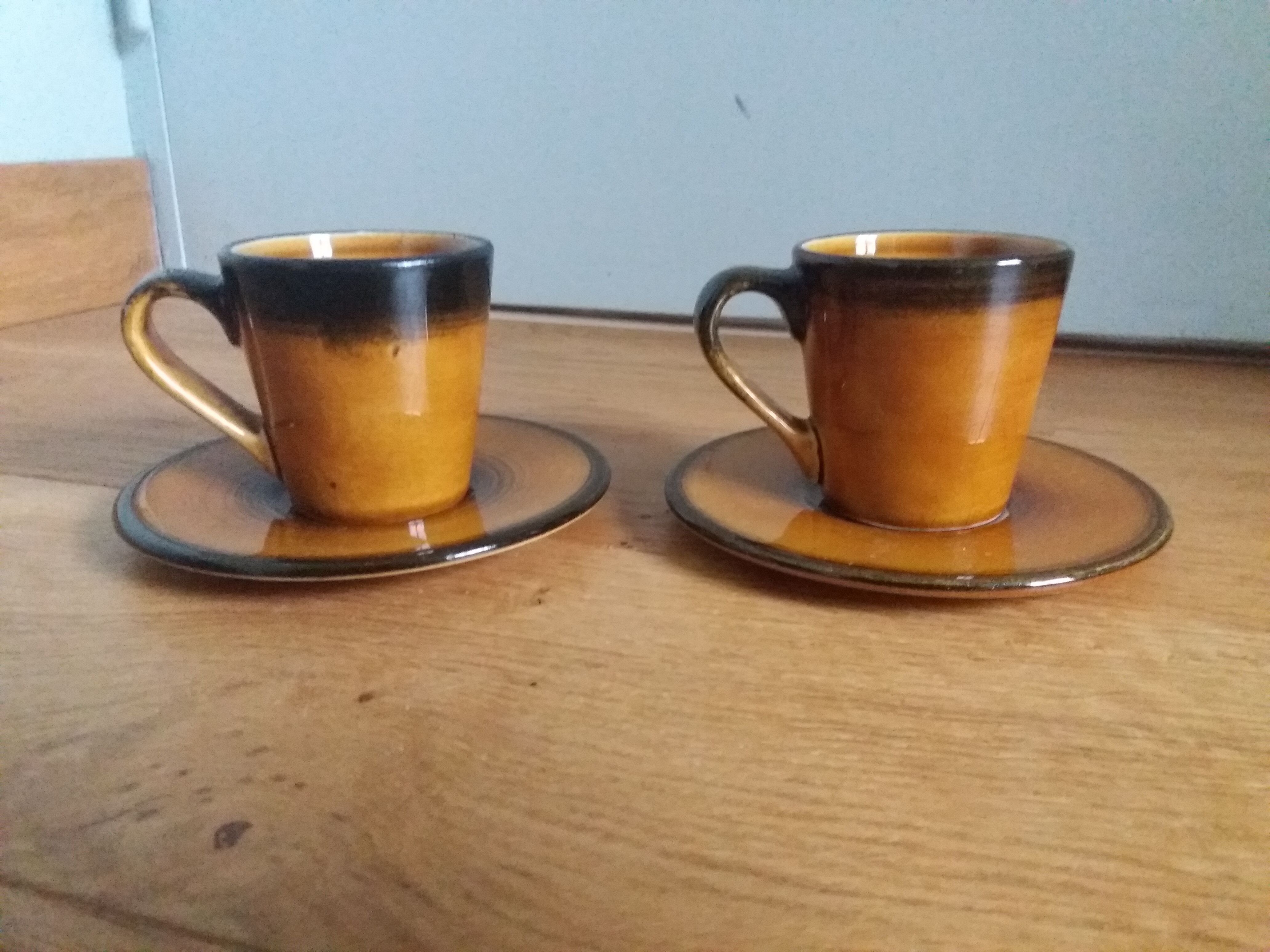 2 Longchamp ceramic coffee cups and saucers