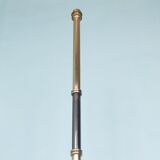 Tripod floor lamp in brass and glass