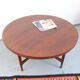 Vintage teak coffee table in 60s-70s style, retro style.