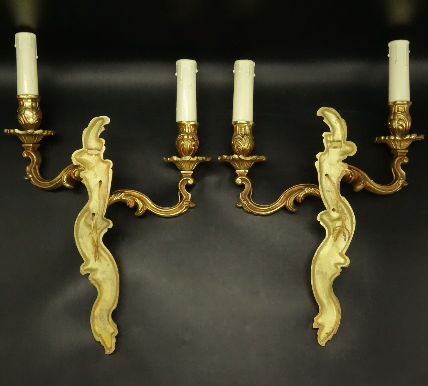 Pair of wall lamps stamped Louis XV style