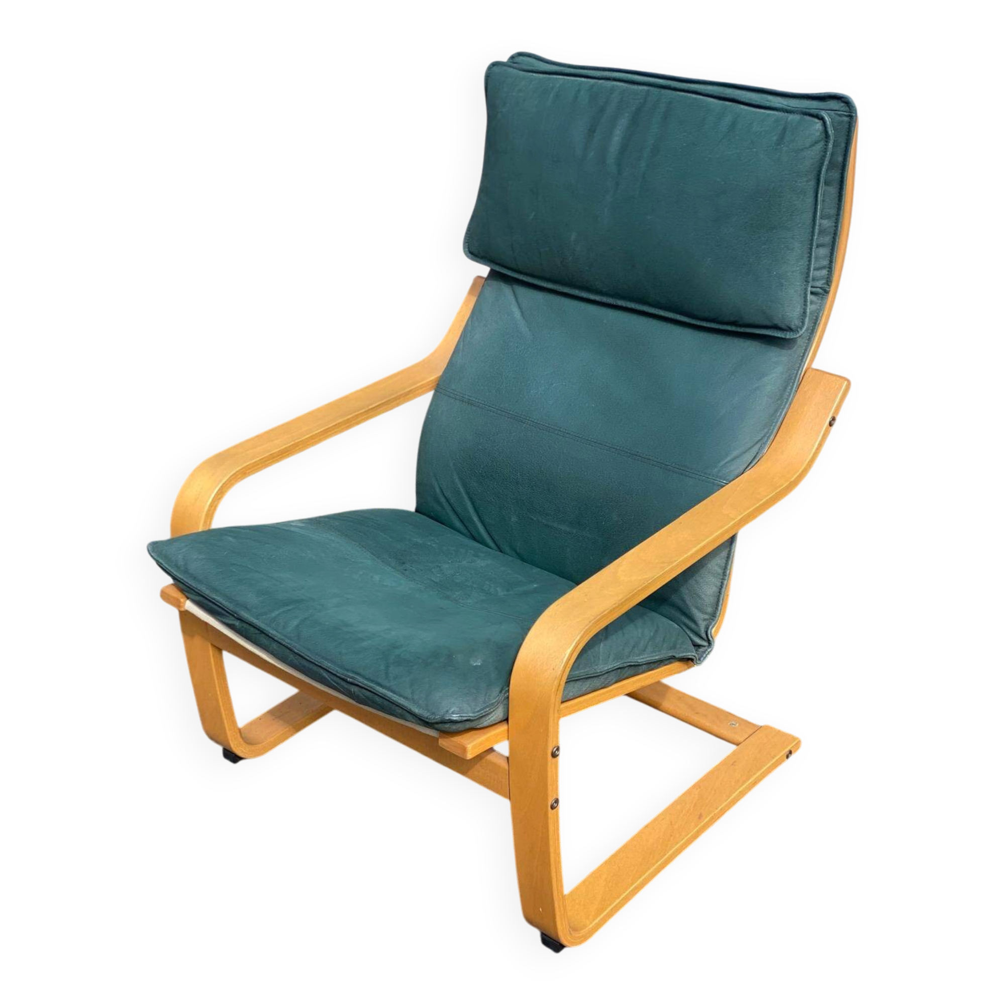 Scandinavian rocking chair with curved wood and green leather, IKEA Poäng.