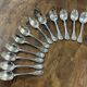 Series of 12 Christofle model Marly dessert spoons in silver metal