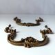 Antique pair of bronze drawer handles.
