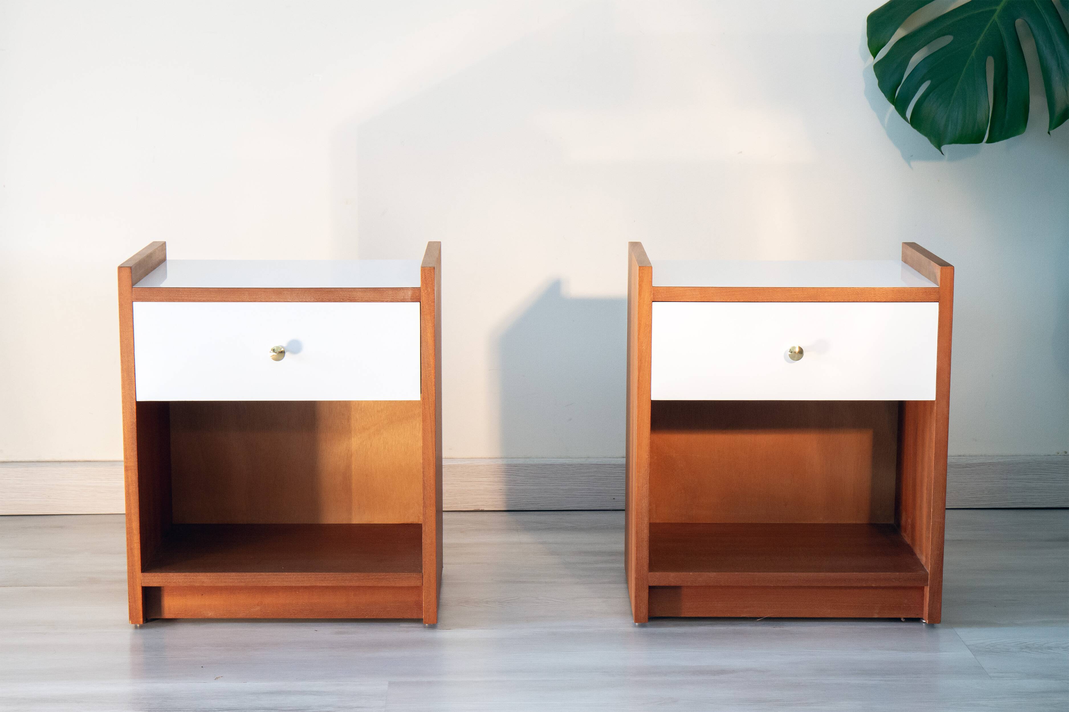 Pair of bedside tables, mahogany, white laminate and brass, 1970