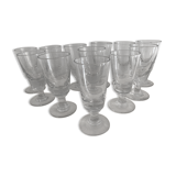 12 old glasses on foot at bistro or absinthe