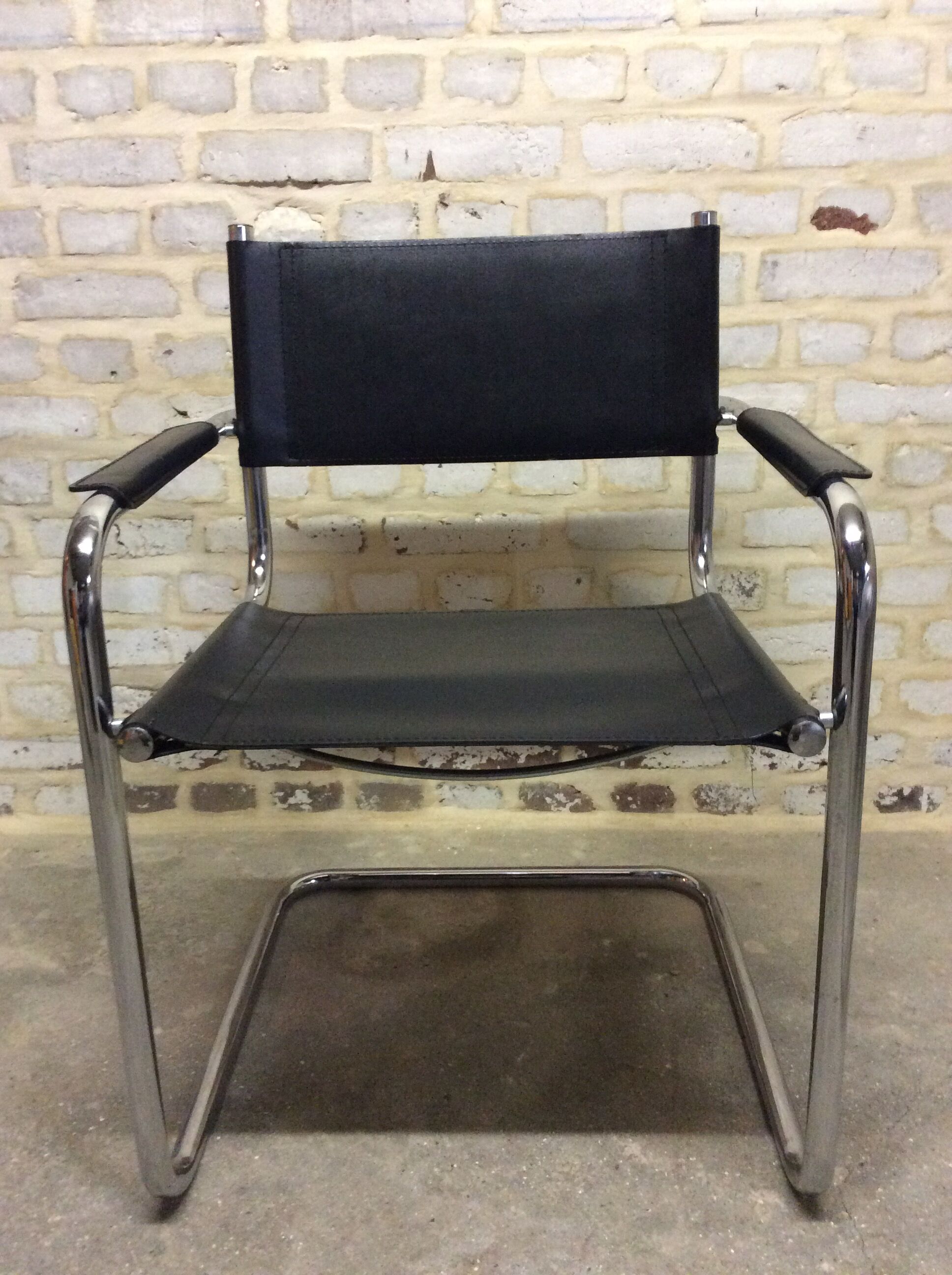 Chair leatherette and brass