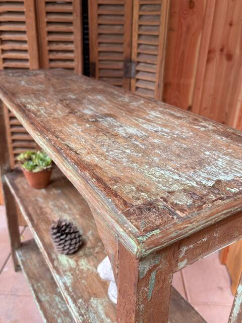 Teak shelves with a green patina