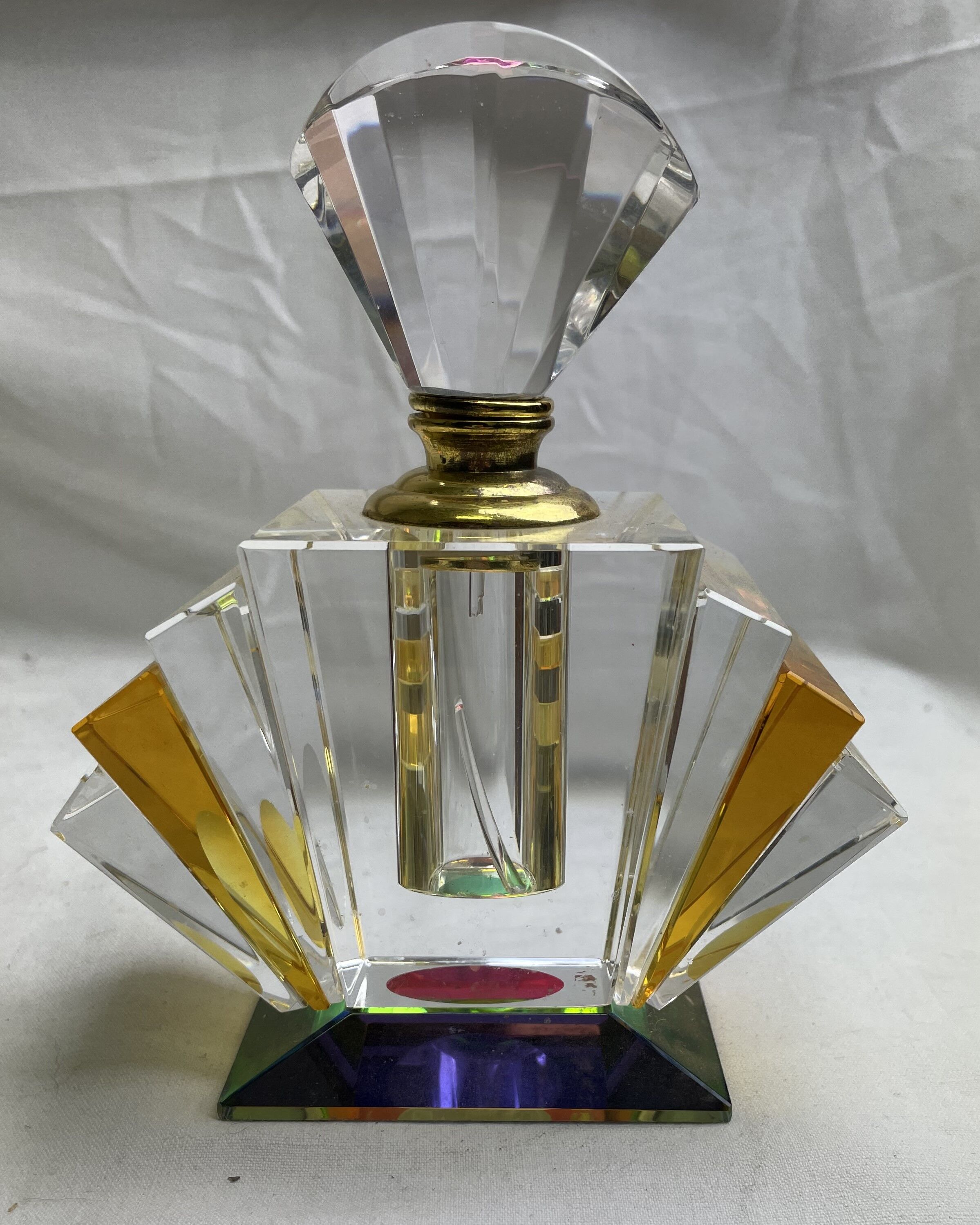Empty art deco perfume bottle in amber crystal