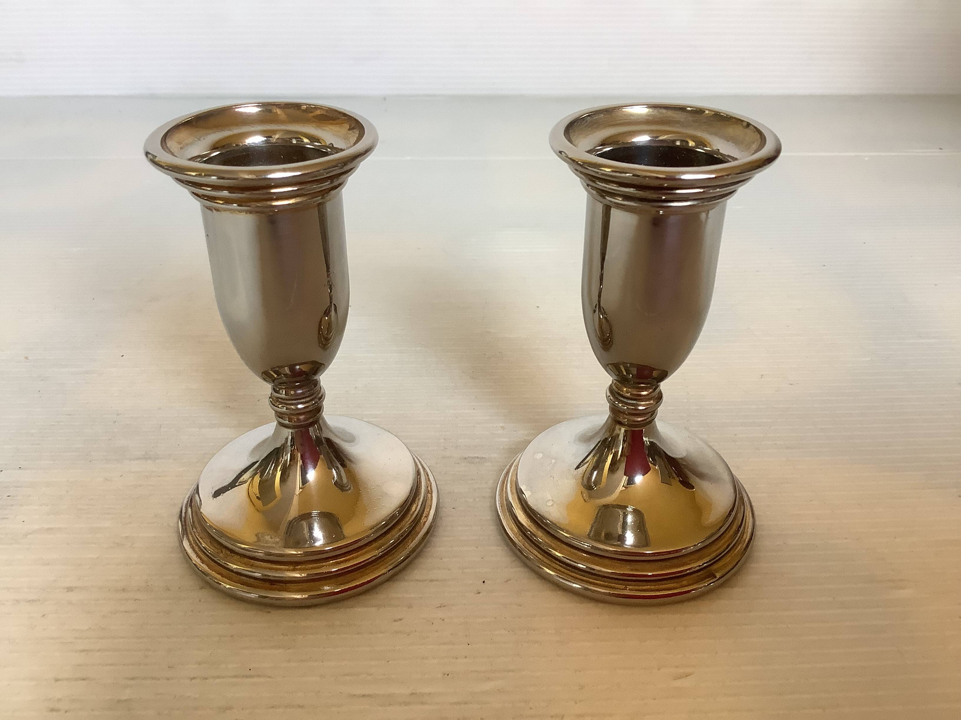 Pair of small silver metal candlesticks Italy